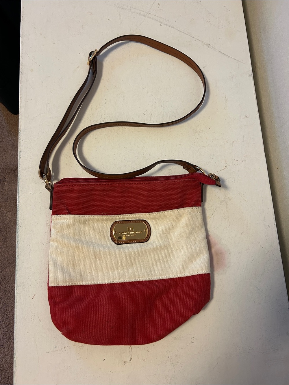 Tommy Hilfiger Women’s Red and White Striped Crossbody Bag